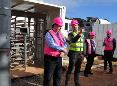 DTPW project leader Gustav Lindemann and Minister Grant at the forensic pathology institute construction site.
