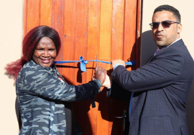eQolweni residents celebrate the one year anniversary of the project with keys to their homes