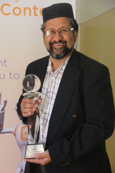 Goolam Mohamed, Acting Director of ECM with the Provincial Star Award for Enterprise Content Management