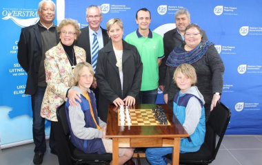 Handing over chess tables to the Library. From left Desmond Lakay, Mayor Nicollete Guthrie-Botha, Stefan Wehmeyer, Minister Marais, Allen Badenhorst, Andre Enslin and Wilna Hooneberg with chess players Dirk and Johan Matthee