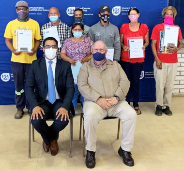 Front L – R: Western Cape Minister of Human Settlements, Tertuis Simmers and Matzikama Municipality Executive Mayor, Councillor Johan Van Der Hoven