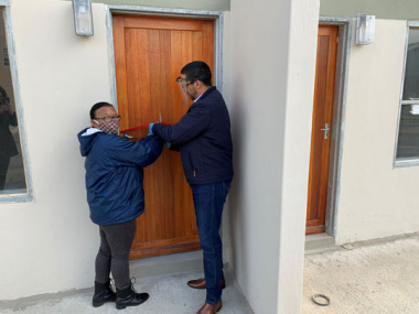Sandra Noble (56) and 19 years on the waiting list and Western Cape Minister of Human Settlements, Tertuis Simmers