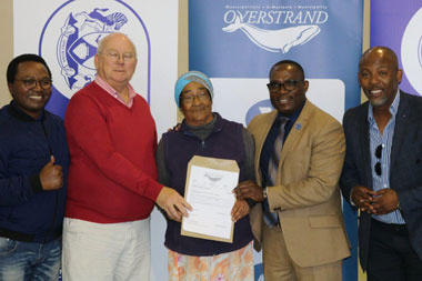 Hawston Resident Receives Title Deeds From Minister Madikizela
