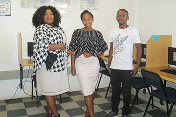 Nomawethu Kosani, Zizipho Magqaza and Thabiso Gongo are ready to assist at the Ilingelethu e-Centre.