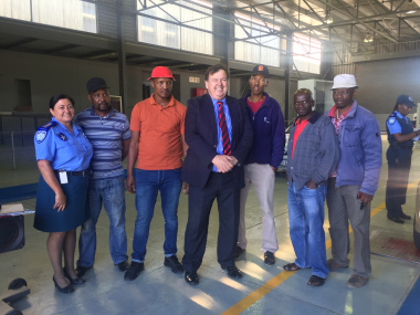 Minister Grant with City of Cape Town Chief Traffic Inspector, Merle Lourens, and minibus taxi owners getting their vehicles tested at Joe Gqabi Transport Interchange in Philippi East.