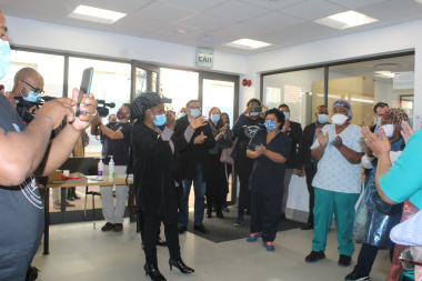Staff at Victoria Hospital welcome Minister Nomafrench Mbombo with a song