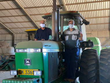 Ivan Cloete and Minister Meyer on tractor