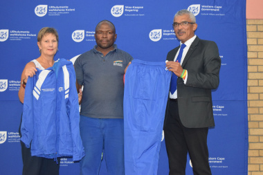 Khaya Rose Rugby Football Club receives equipment from Minister Anroux Marais and Richard Buckley at the Metro Sport Funding Ceremony