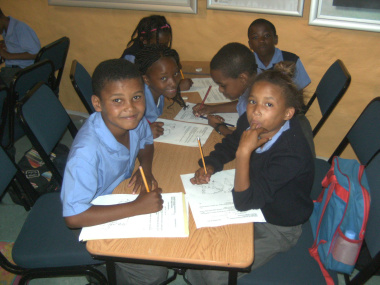 Learners completing their worksheets for the National Symbos DCAS Museum Educational Programme