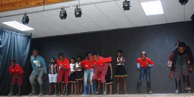 Learners from Bongolethu Primary School performing a traditional Gumboot Dance