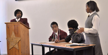 Making a point during the provincial debate competition.