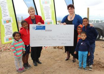 MEC of DCAS Anroux Marais and Executive Mayor of Breede Valley Municipality Antoinette Steyn with children from the Avian Park community