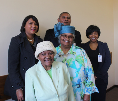 From back left: Rose Parent Valecia De Beer Swano, who cares for six Rose patients Vincent Weeder, Social Work Supervisor and Estelle Silence, Social Worker Manager from Lentegeur Hospital. Saartije, a Rose patient who has been cared for by Aletta Exford.