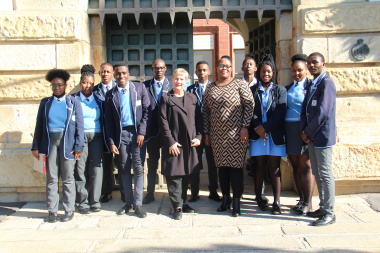 Minister Anroux Marais and Director of the Western Cape Archives and Records Service, Nomaza Dingayo, are joined by pupils from Y2K High School.