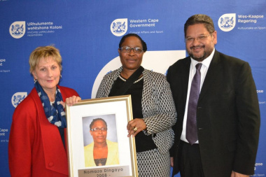 Minister Anroux Marais, Director Nomaza Dingayo and HOD Brent Walters with one of the new photos that was unveiled