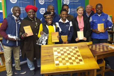 Minister Anroux Marais handling over the chess tables to the Friends of the Nazeema Isaacs Library in Khayelitsha.