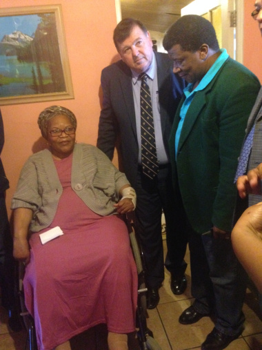 Minister Grant and Mandla Mata from SANTACO with Ms Miriam Letsaba who sustained a spinal cord injury during a crash.