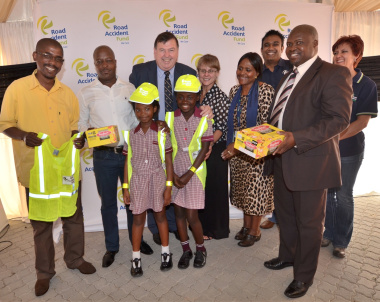 Minister Grant and RAF Board Members handed out reflective vests to primary school children.
