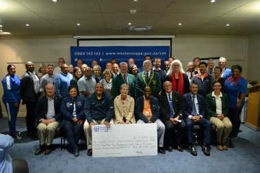 Minister Anroux Marais and HOD Guy Redman with representatives from all Metro federations that received funding.