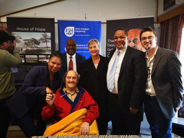 Minister Anroux Marais and Denis Goldberg with Chief Director Guy Redman, Director Mxolisi Dlamuka and Deputy Director Janse van Rensburg who facilitated the agreement