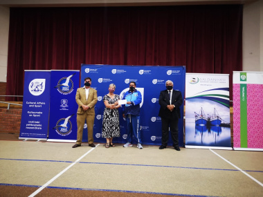 Minister Anroux Marais hands over funding to one of the federations.