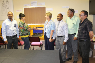 Minister Marais officially opens the ICT facility with one of the librarians Lorraine Felix. With them are municipal councillors Hartnick, Carelse and Jacobs, and the acting municipal manager Keith Stuurman