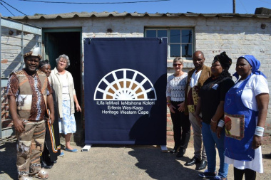 Minister Anroux Marais with board members and staff members before the official unveiling of the provincial heritage plaque of Llwandle Museum