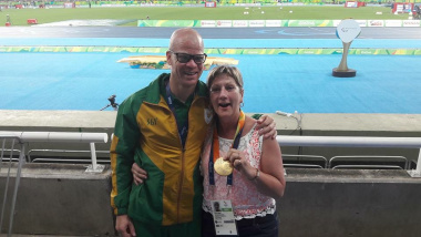 Minister Anroux Marais with Paralympian Hilton Langenhoven after he won the gold in the long jump event