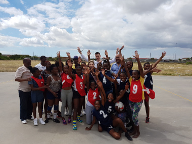Minister Marais with some of the children who participated in the sporting activities