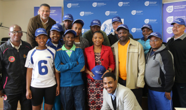 Minister Mbombo with DCAS Sport Development Staff and the team captains.