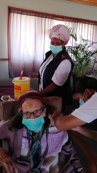 Ms Arna Theys (93) from Sencit Old Age Home in Strand receiving her Pfizer booster vaccination. 