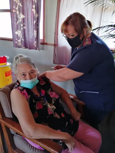 Ms Hazel Malherbe (72) from Sencit Old Age Home in Strand receiving her Pfizer booster vaccination. 