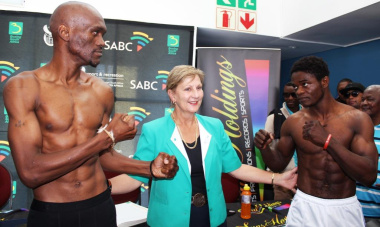 Nkuleleko Mhlongo and Christiano Ndombussy participating in the main bout for the WBA Pan African Title with Minister Marais.