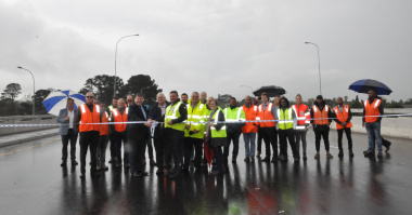 Minister Grant and officials of the department as well as members of the project team, at the official ribbon-cutting ceremony on the new Old Oak Bridge.