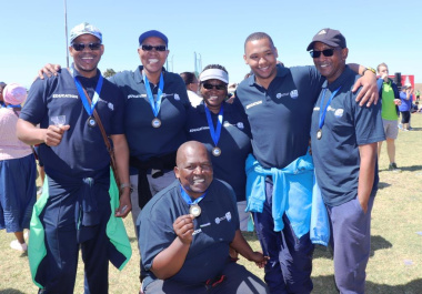 Participants from the Western Cape Education Department showing off their medals after the fun run and walk.