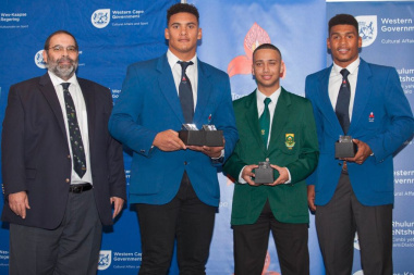 Paul Hendricks from DCAS with the nominees and winner of School Sportsman of the Year Juarno Augustus, Keegan Agulus and Damian Willemse