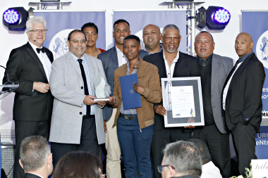 Paul Hendricks (second from left) accepts one of the awards from Premier Alan Winde (first from left) on Wednesday night