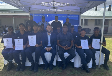 seated in front in the centre is Western Cape Minister of Police Oversight and Community Safety, Reagen Allen on the left and next to him is the Bergrivier Municipality Executive Mayor, Alderman Ray van Rooy.