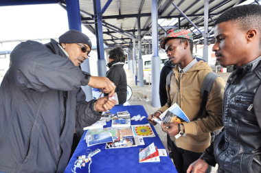 Road Safety Officer Anthony September engages with passengers at the Gugulethu taxi rank.
