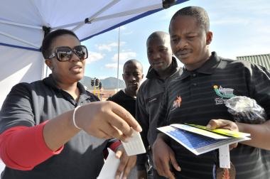Road safety Officer Notsikelelo Nqgabuko demonstrates how to use drug testing equipment.