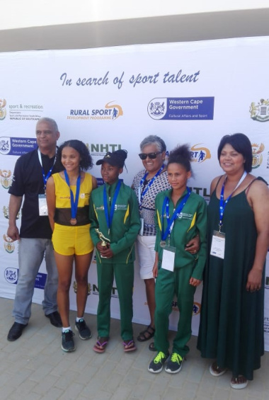 Sharon Siljeur, Treasurer of Cape Town Sport Council, with the two proud Central Karoo Sport Academy winners who won gold and silver