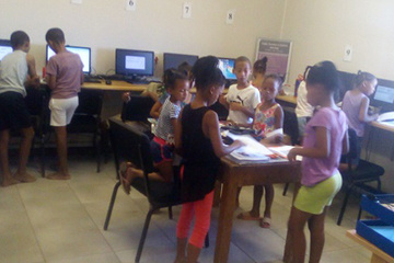 Kids from the primary school in the area in Bitterfontein engaged in the programmes that the e-Centre has to offer.
