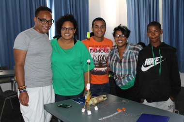 Teamwork makes dreamwork! A group of students who built the tallest structure in the CCDI session using only spaghetti, marshmallows and rubber bands