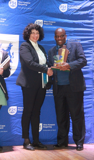 Thabo Tutu from DCAS with the Sportwoman with a Disabilty Winner, Susan Agrella