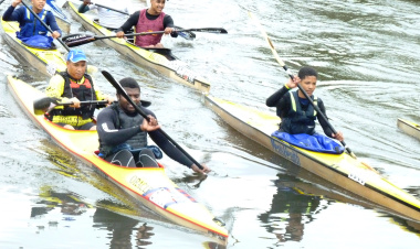 The Minister of Cultural Affairs and Sport, Dr Ivan Meyer paddles with the  Berg River Canoe Marathon Development teams on Sunday.