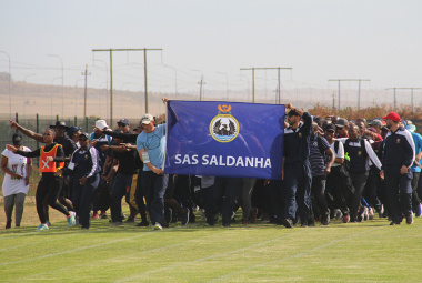 The Saldanha Naval Base officials brought the most energy to their march around the field, singing and dancing as they went