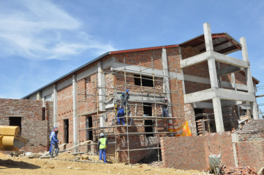 The school hall under construction.