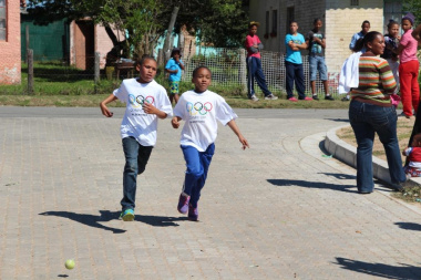 Two learners finishing the 4 km fun run