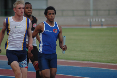 Under 17 Athlete Darryn Williams running in the medley event.