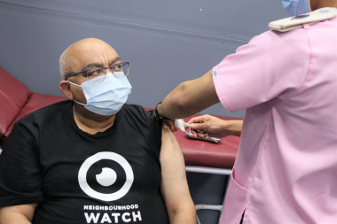 Minister Albert Fritz gets the COVID-19 vaccination. 